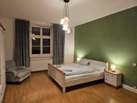 Das Gr&uuml;ne Zimmer mit gro&szlig;em Doppelbett